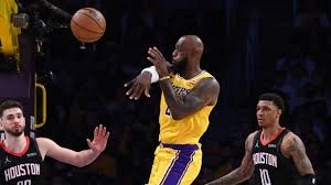 LEBRON JAMES DELIVERS HISTORIC TRIPLE-THREAT PERFORMANCE AS 